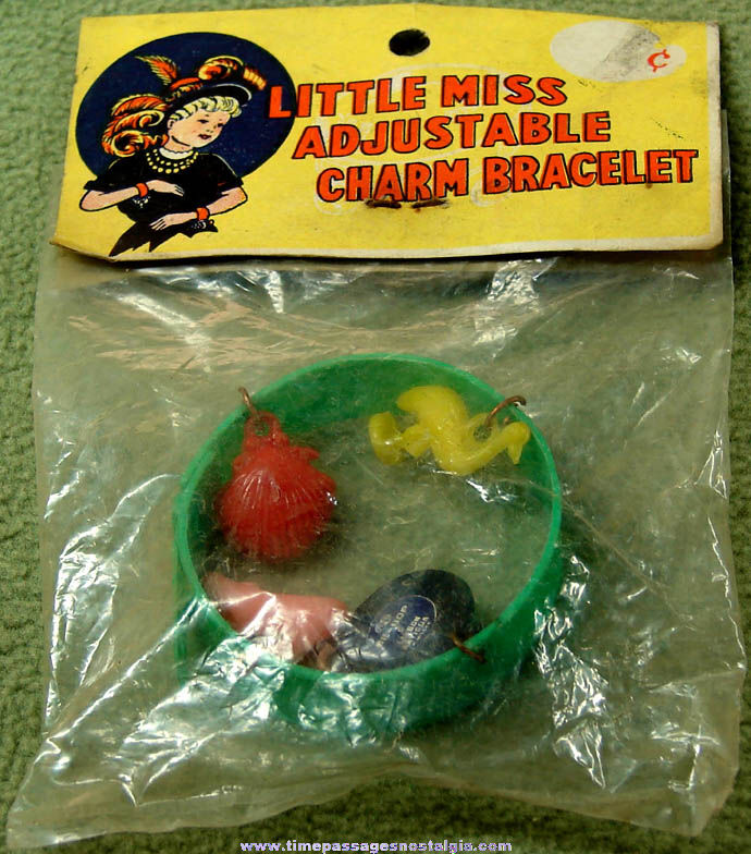 Old Unopened Toy Jewelry Charm Bracelet With (4) Different Miniature Charms