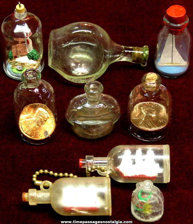 (9) Miniature Novelty or Souvenir Bottles With Items Inside