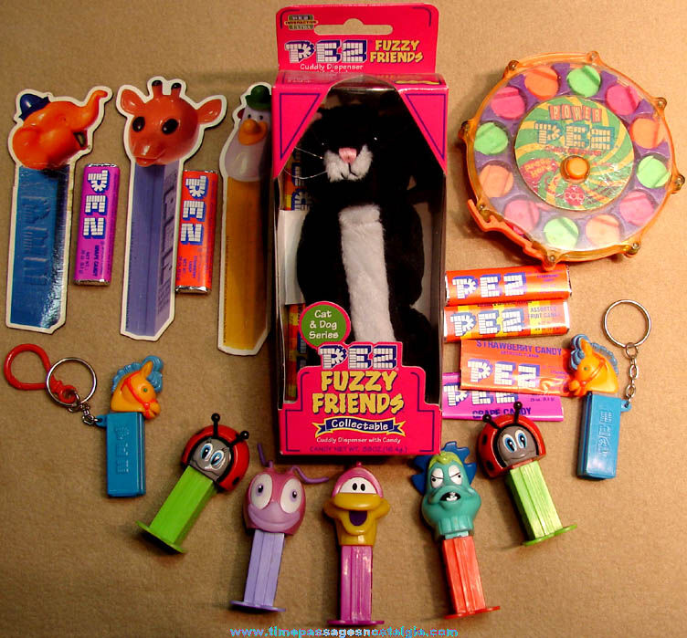 (18) PEZ Candy Advertising and Candy Dispenser Items