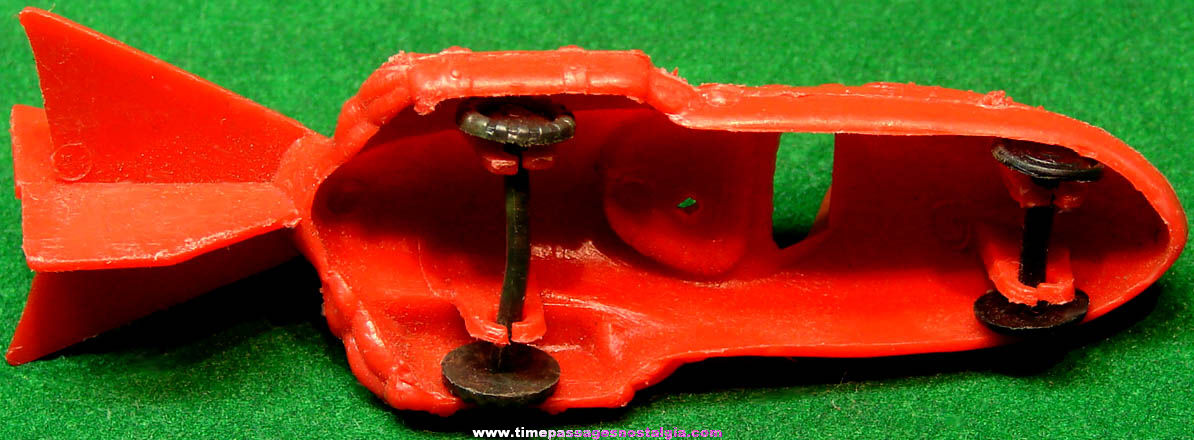 Old Miniature Novelty Red Plastic Toy Space Car