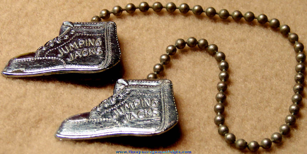 Old Metal Jumping Jacks Shoe Advertising Sweater Clip Chain