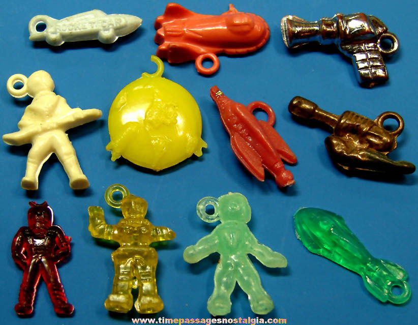 (11) 1950s Space Related Gum Ball Machine Prize Toy Charms