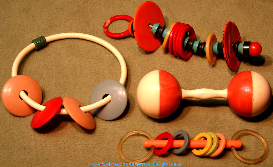 (4) Different Early Colorful Plastic or Bakelite Baby Teething Toys & Rattle