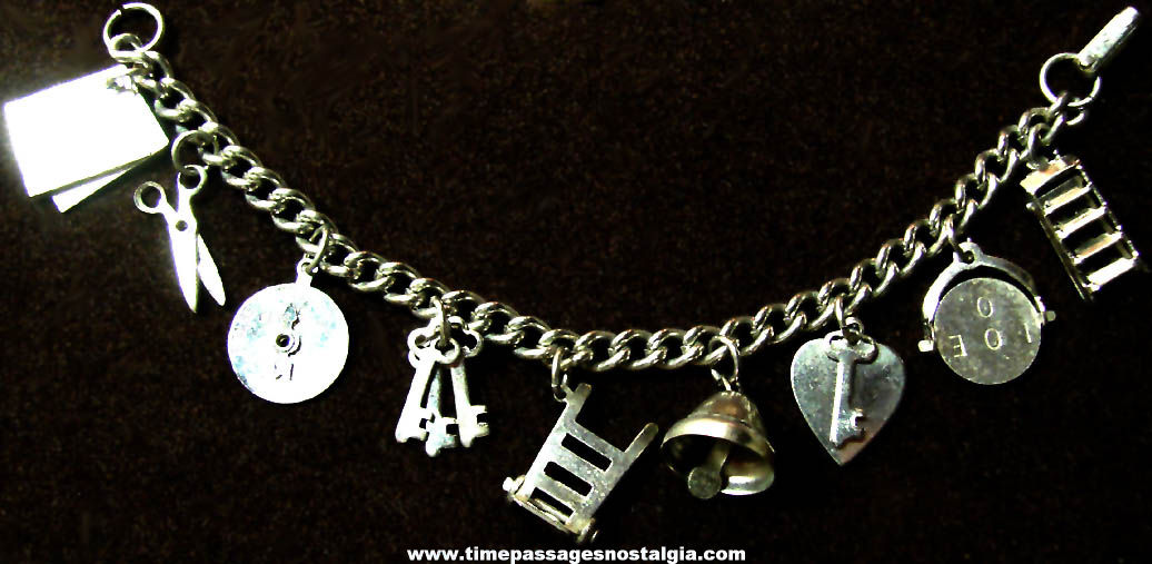 Old Silver Colored Metal Jewelry Charm Bracelet With (12) Charms