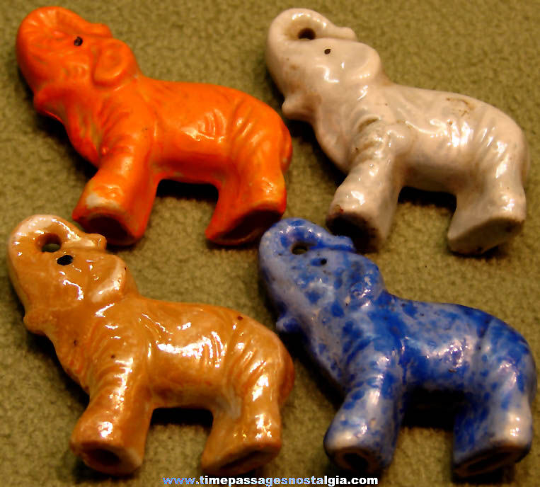 (4) Different Colored 1930s Cracker Jack Pop Corn Confection Porcelain Elephant Animal Figurine Toy Prizes