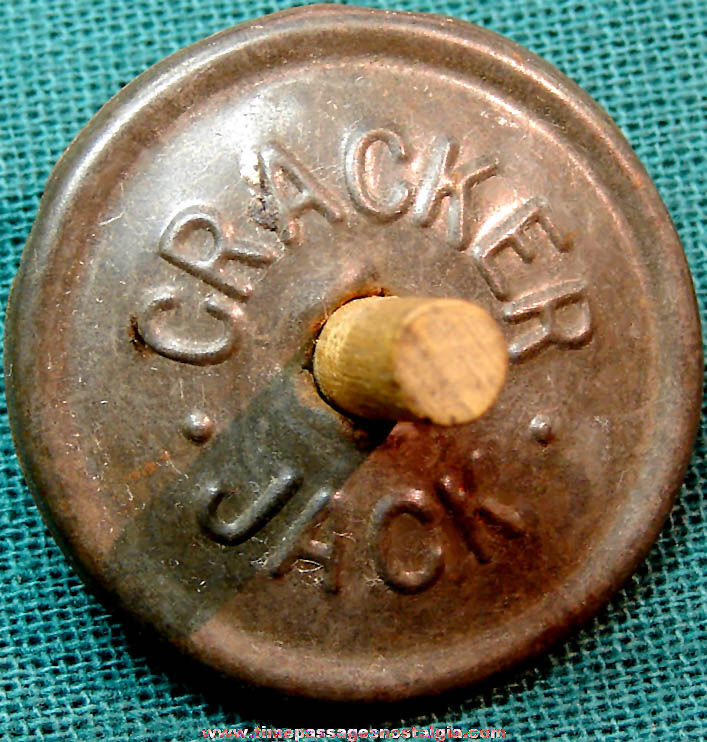1920s Cracker Jack Pop Corn Confection Advertising Embossed Tin Spinner Top Toy Prize