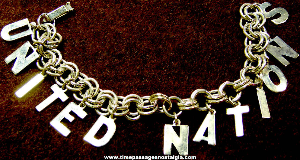 Old United Nations Jewelry Charm Bracelet with (13) Miniature Metal Letter Charms