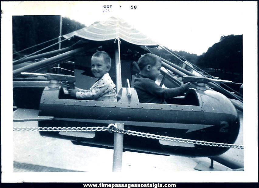 1958 Carnival or Amusement Park Space Ship Ride with Boys & Machine Guns Photograph