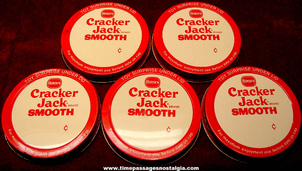 (5) Early 1970s Cracker Jack Peanut Butter Jar Advertising Lids with Different Unopened Toy Prizes