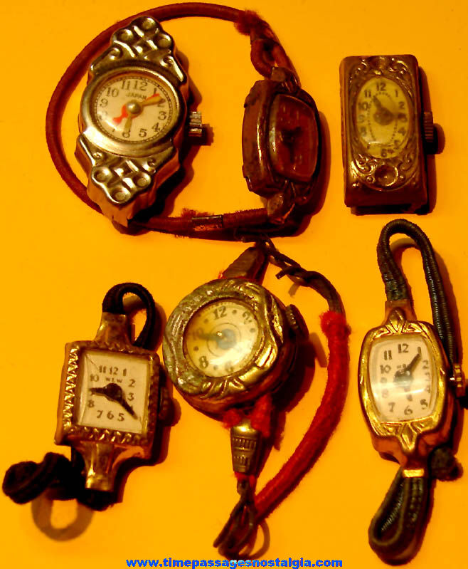 (6) Different 1930s Cracker Jack Pop Corn Confection Tin Toy Prize Watches