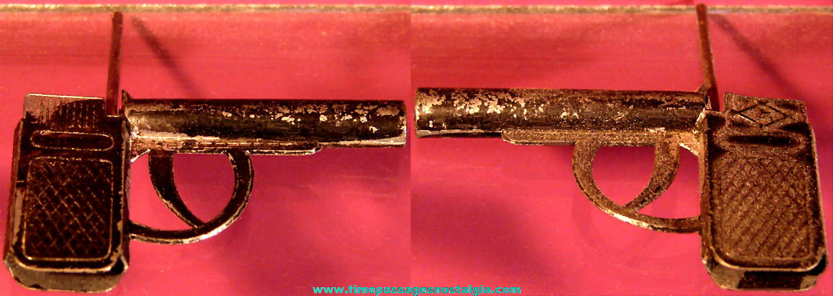 Old Cracker Jack Pop Corn Confection Pot Metal or Lead Miniature Toy Prize Spring Action Match Stick Pistol Gun