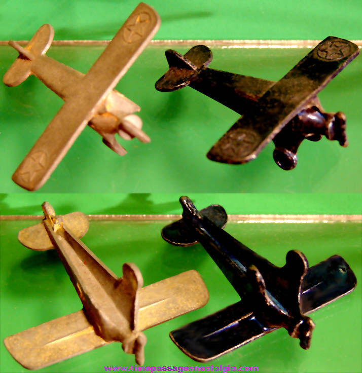 (2) Matching Old Cracker Jack Pop Corn Confection Miniature Pot Metal or Lead Toy Prize Military Airplanes