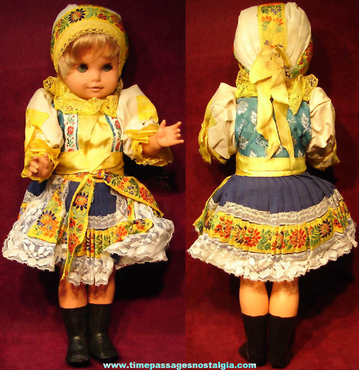 Old Unidentified Colorful Dressed Toy Blonde Girl Doll