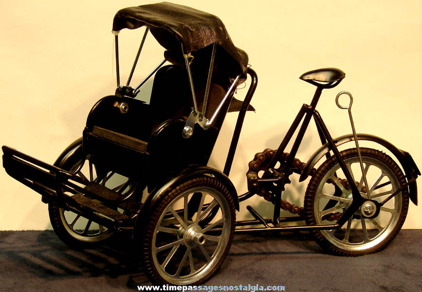 Black Metal Three Wheeled Bicycle Rickshaw Ride