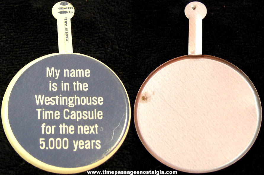 1964  1965 New York Worlds Fair Westinghouse Time Capsule Advertising Souvenir Tin Tab Button