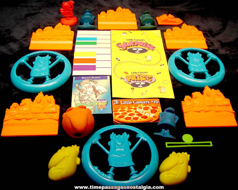 (21) Small Colorful Old Little Caesars Pizza Restaurant Advertising Character and Toy Premium Items