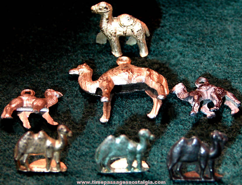 (7) Old Cracker Jack Pop Corn Confection Pot Metal or Lead Toy Prize Camel Animal Charms and Figures