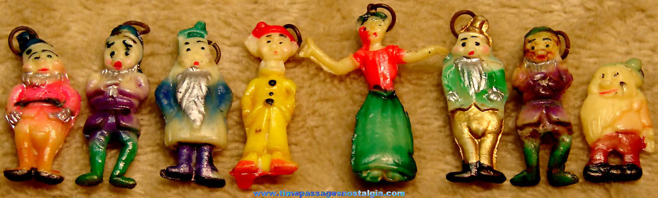 Early Set of (8) Different Snow White and The Seven Dwarfs Painted Celluloid Charms